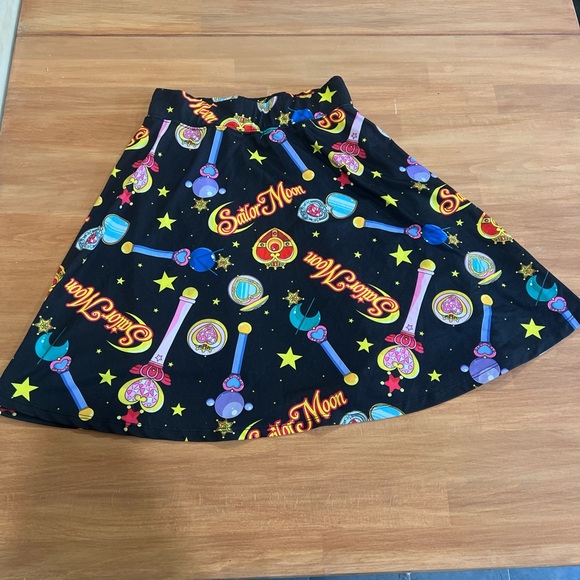 Sailor Moon Dresses & Skirts - Vibrant Black A-Line Skirt with Colorful Motifs